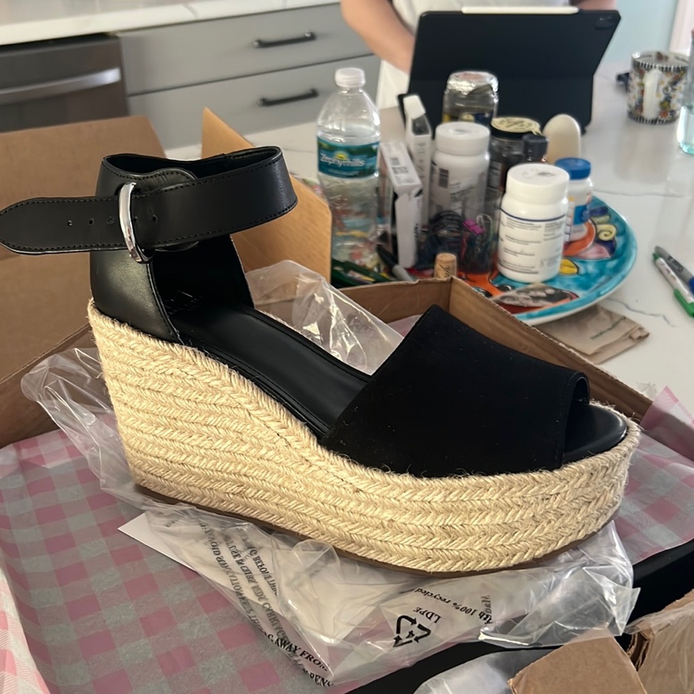 These sandals are brand new wrapped in original package.